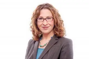 female executive headshot on white background in Boston